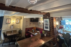 Queen Arms inside pub with fire alarm on the ceiling