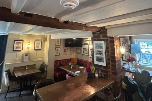 Queen Arms inside pub with fire alarm on the ceiling